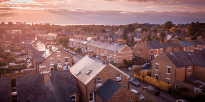 Residential housing with sunrise